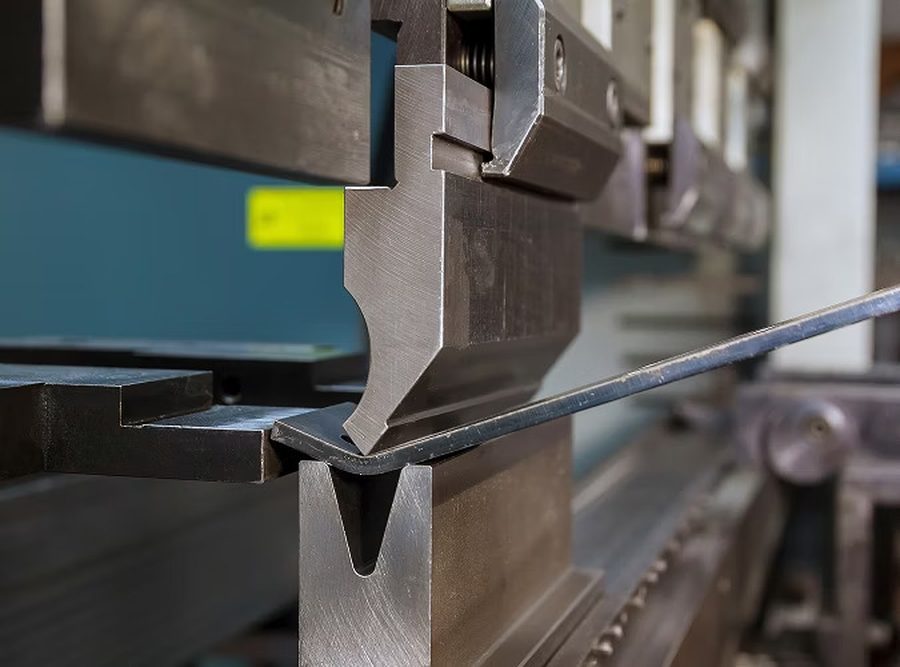 CNC press brake bending a sheet metal profile